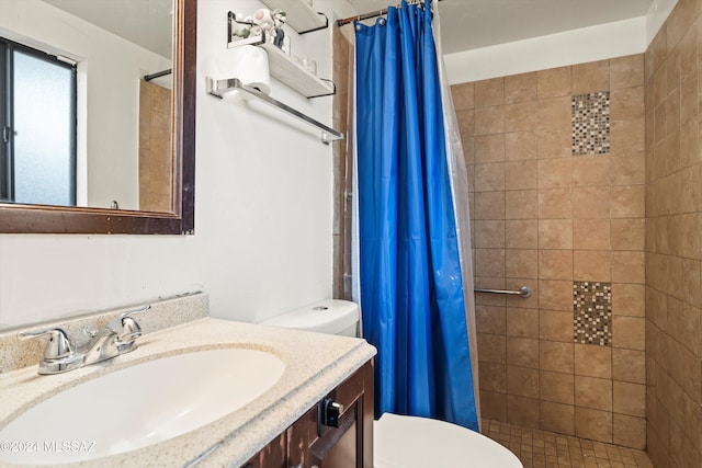 bathroom featuring a shower with curtain, vanity, and toilet