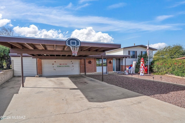 view of front of home featuring a carport and a garage