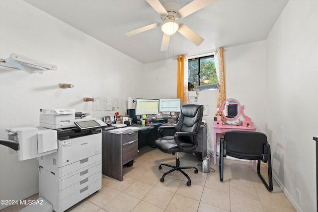 office area with ceiling fan and light tile patterned flooring