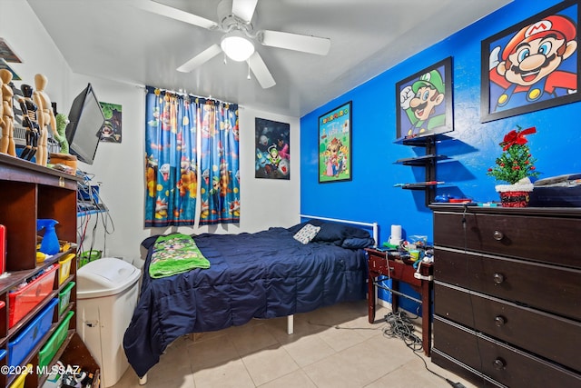 tiled bedroom with ceiling fan