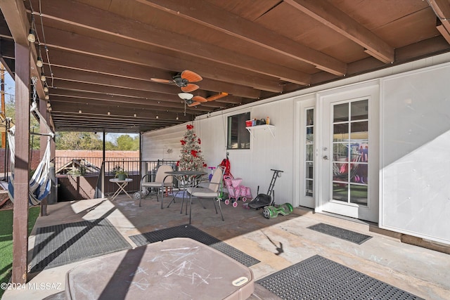 view of patio / terrace featuring ceiling fan