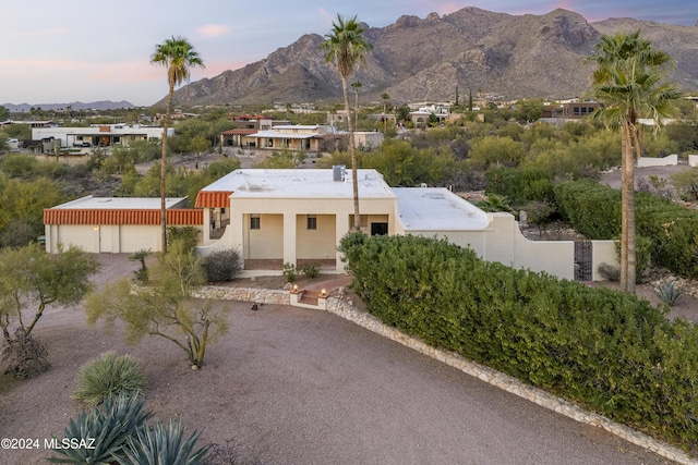 view of front of property with a mountain view