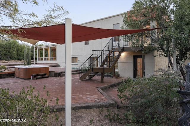 view of patio with a hot tub