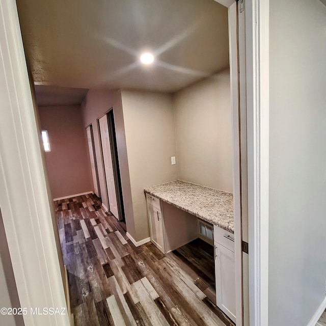 interior space with dark wood-type flooring