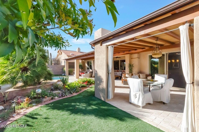 view of yard with a patio area and a swimming pool