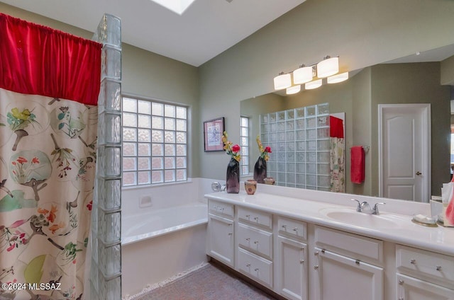 bathroom with separate shower and tub and vanity