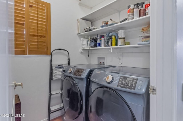 laundry area with separate washer and dryer