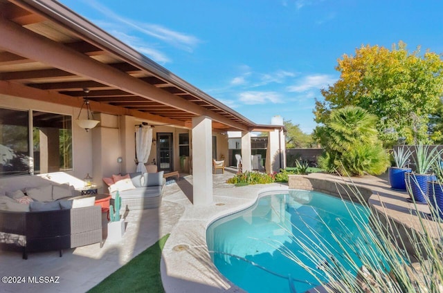 view of pool with ceiling fan, an outdoor hangout area, and a patio