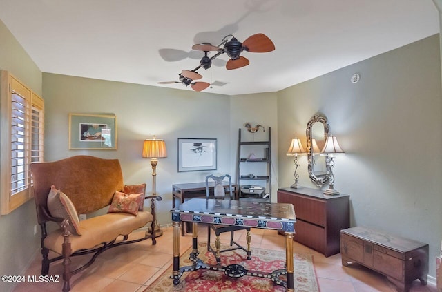 tiled office space with ceiling fan