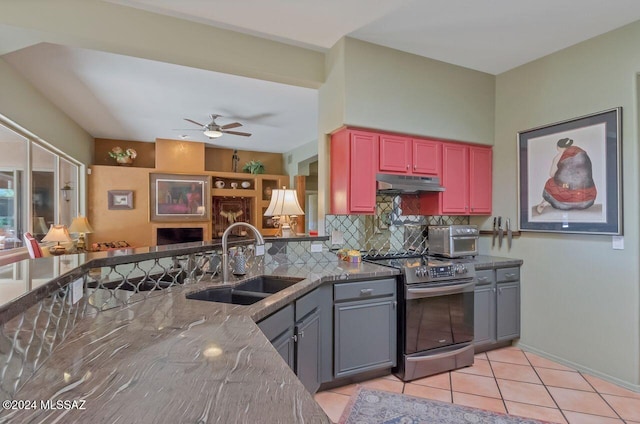 kitchen with tasteful backsplash, ceiling fan, stainless steel electric stove, sink, and light tile patterned flooring