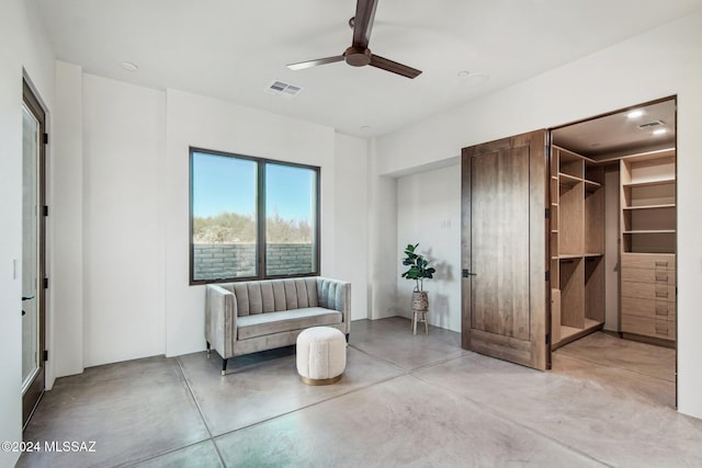 unfurnished room featuring ceiling fan