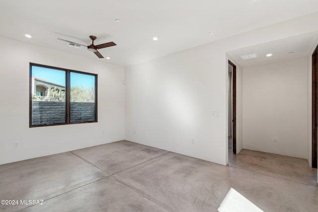 spare room with ceiling fan