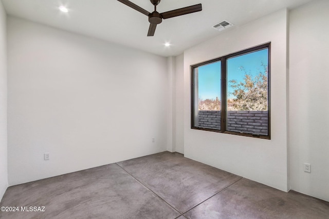 unfurnished room with ceiling fan