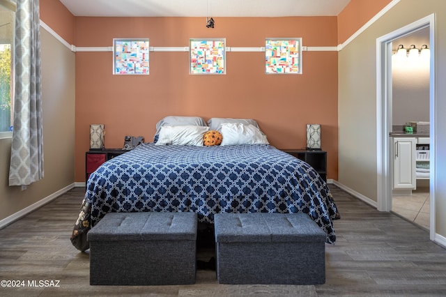 bedroom featuring hardwood / wood-style flooring