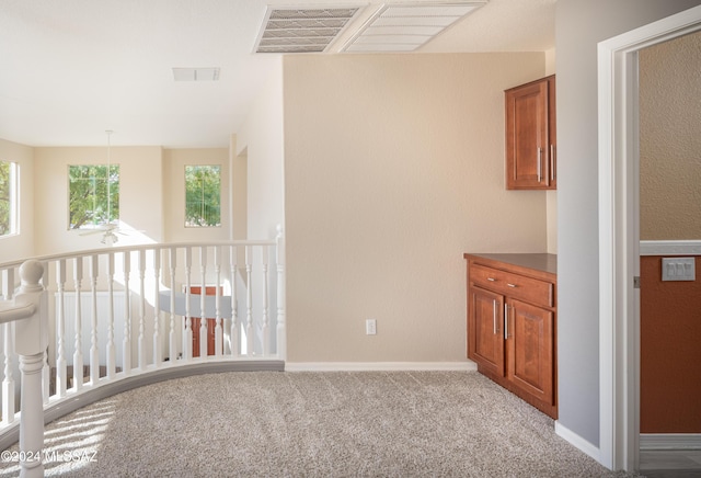 interior space with light colored carpet