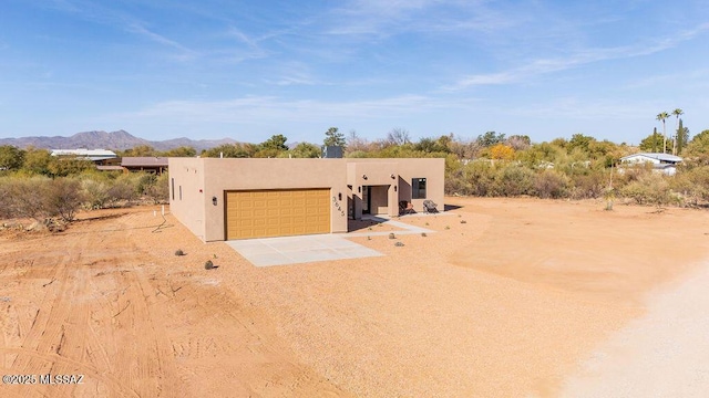 southwest-style home featuring a mountain view