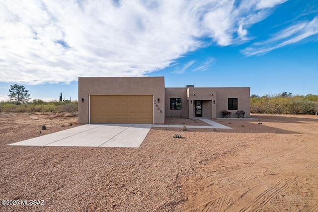 adobe home with a garage