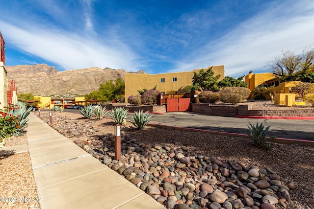 exterior space featuring a mountain view