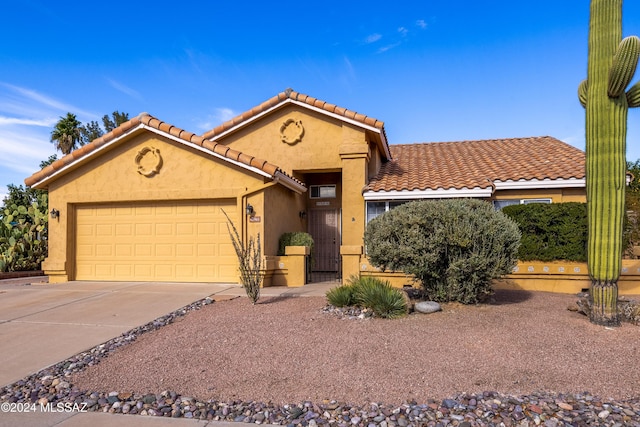 view of front of home with a garage