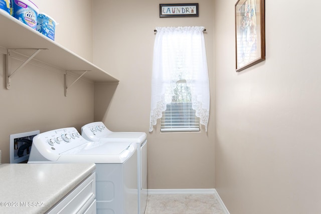 laundry room featuring washing machine and dryer