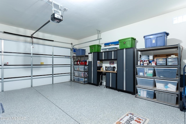 garage featuring a garage door opener