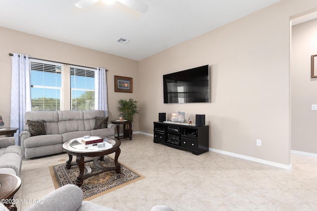 living room featuring ceiling fan