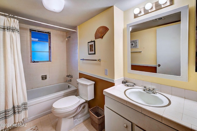 full bathroom with tile patterned flooring, vanity, toilet, and shower / bathtub combination with curtain