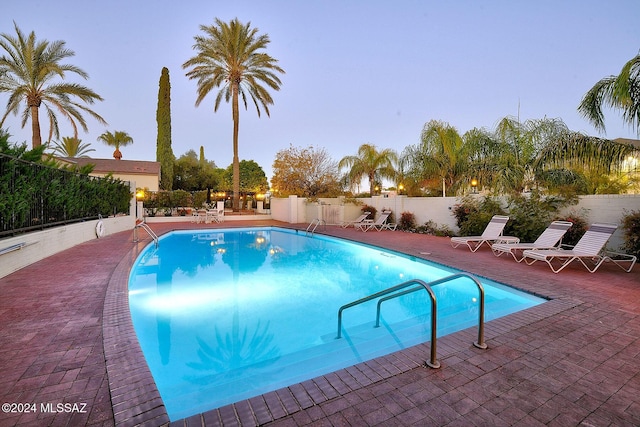 view of pool featuring a patio area