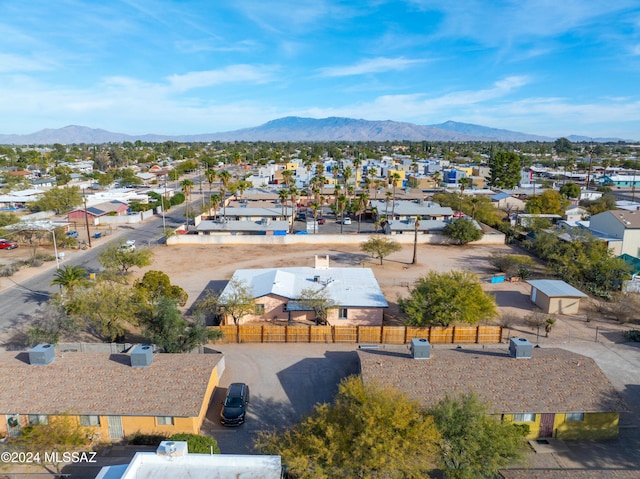 birds eye view of property featuring a mountain view