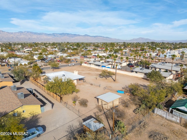 birds eye view of property featuring a mountain view