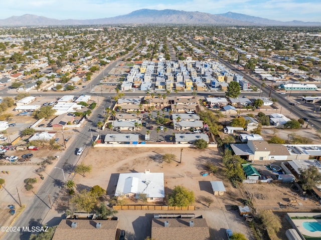 birds eye view of property featuring a mountain view