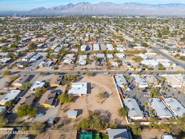 drone / aerial view featuring a mountain view