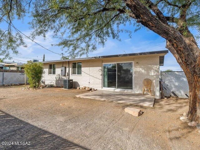 rear view of property with a patio area