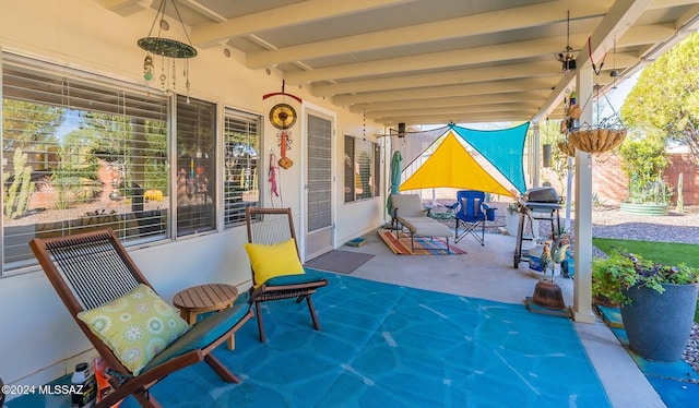 view of patio with a grill