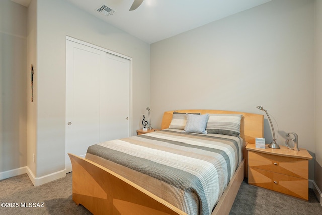 bedroom featuring carpet flooring, ceiling fan, and a closet