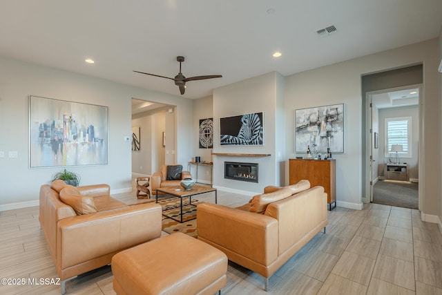 living room with ceiling fan