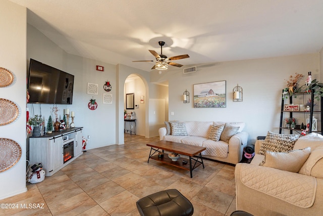 living room featuring ceiling fan