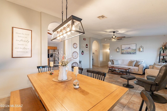 dining space featuring ceiling fan