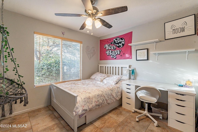 bedroom featuring ceiling fan