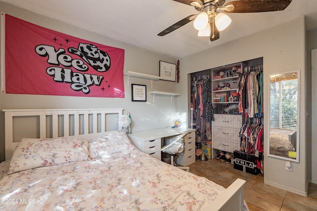 bedroom featuring ceiling fan and a closet