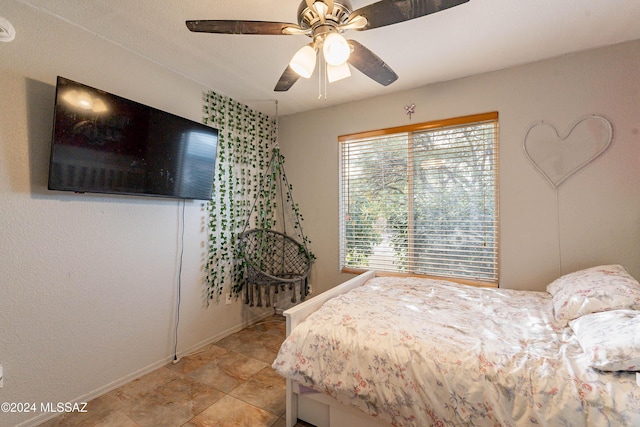 bedroom featuring ceiling fan