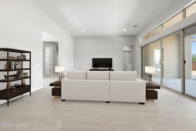 living room with light hardwood / wood-style flooring