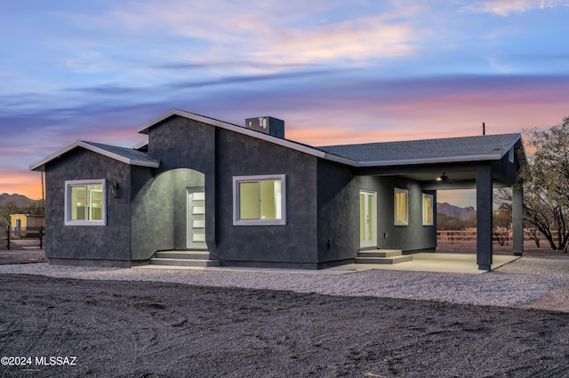 view of front of property featuring a patio area