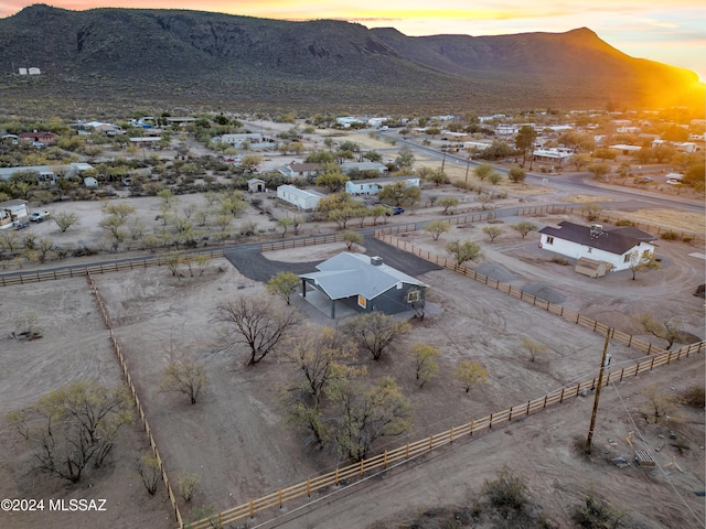 aerial view at dusk with a mountain view