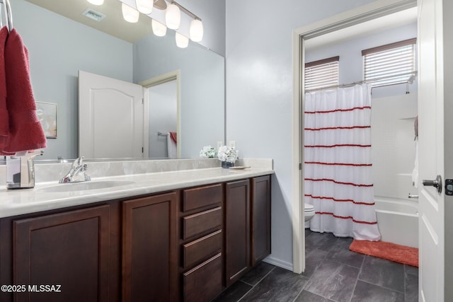 full bathroom with vanity, toilet, and shower / bathtub combination with curtain