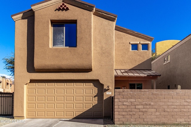 view of front of home featuring a garage