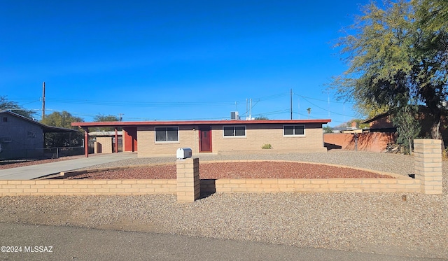 view of front facade featuring a carport