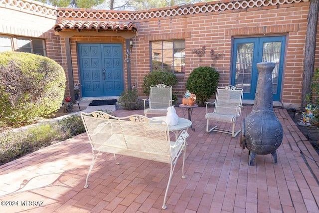 view of patio featuring french doors