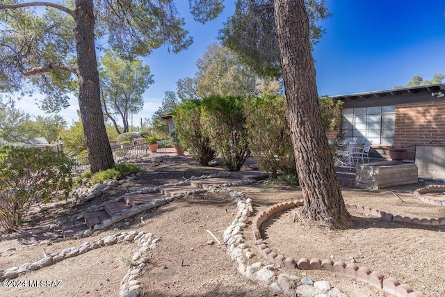 view of yard with fence