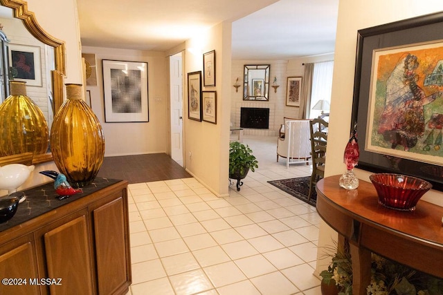 hallway featuring light tile patterned flooring